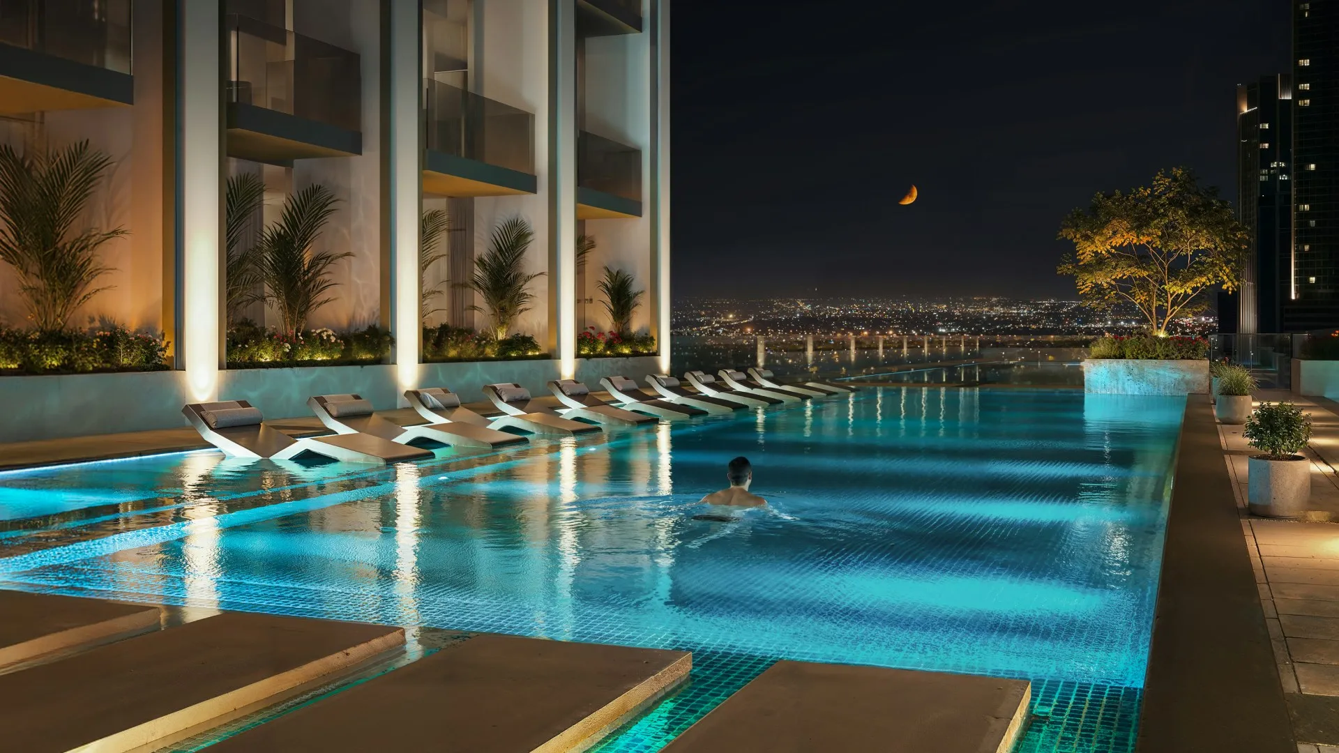 Render of the pool at Binghatti Etherea at night
