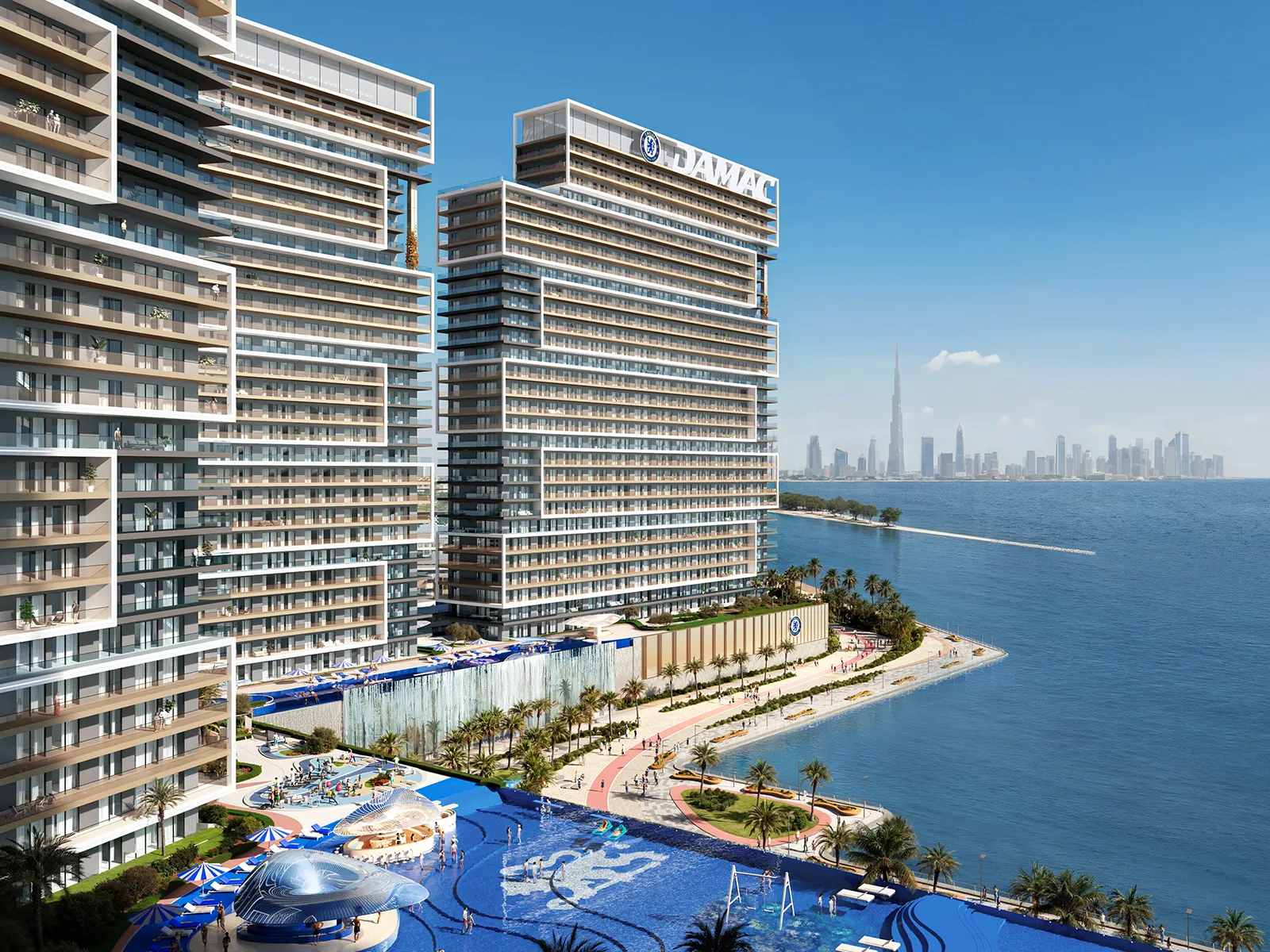 Render of the towers above a beach and pool deck, with the Dubai skyline across the water