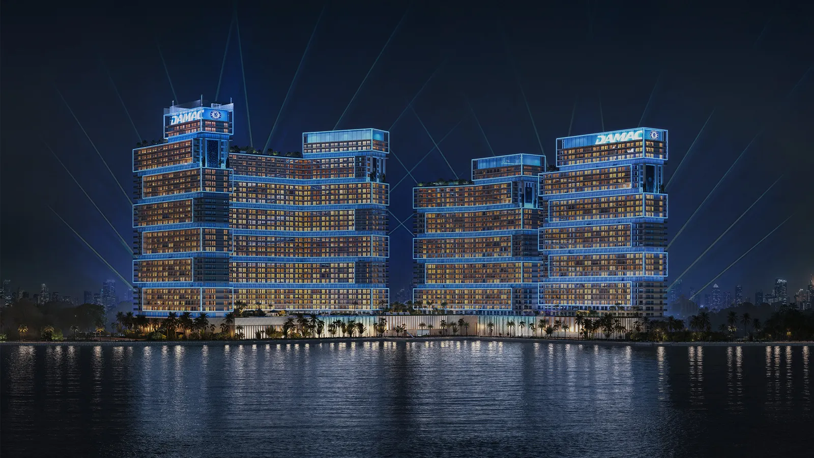 Night render of the Chelsea Residences towers lit up across the water
