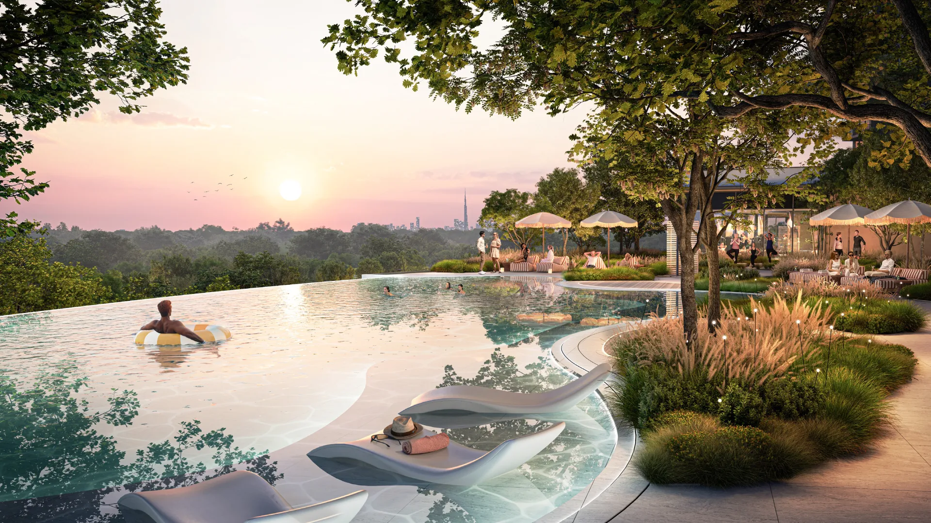 Infinity-edge pool at sunset overlooking the Ghaf Woods canopy