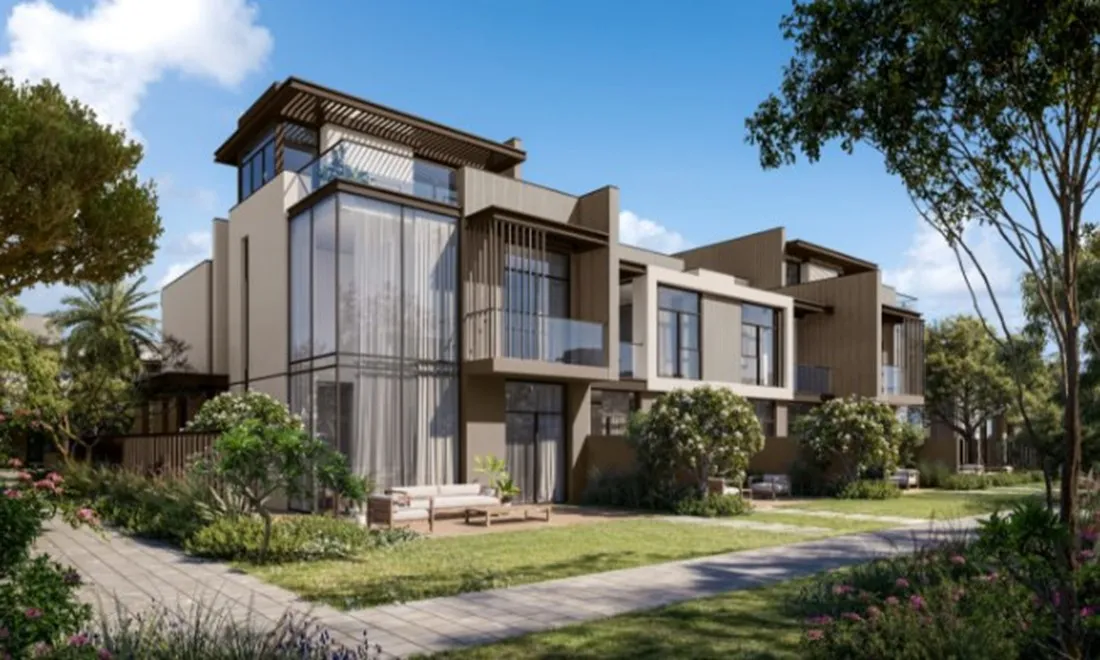Three-storey La Tilia townhouse facade with garden path