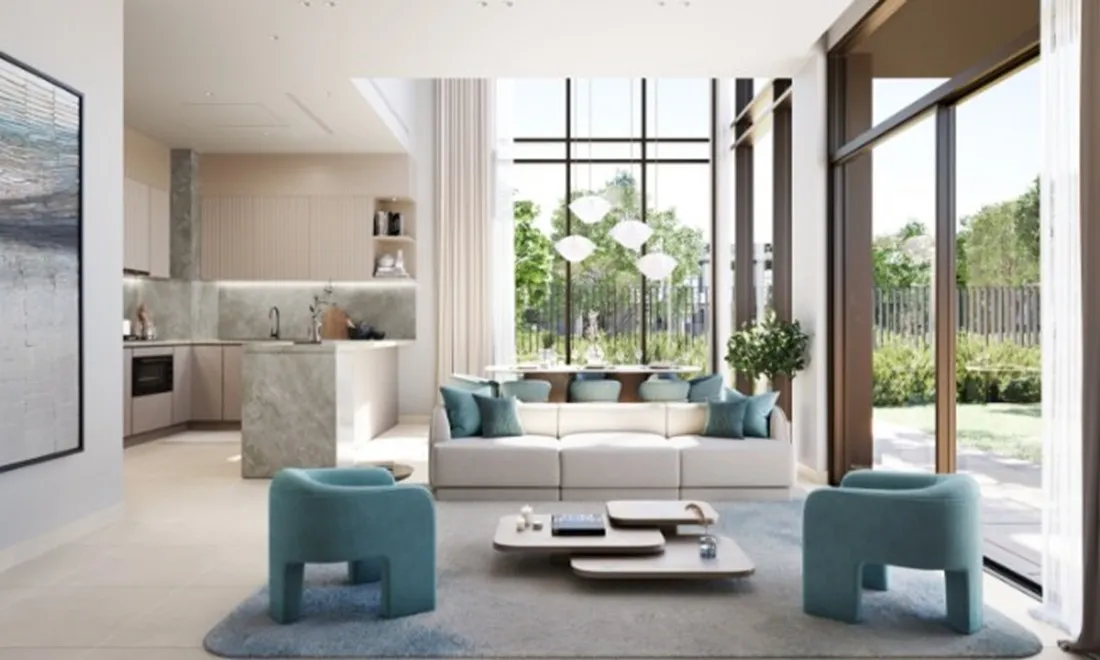 Open-plan living area and kitchen opening onto a private garden, La Tilia