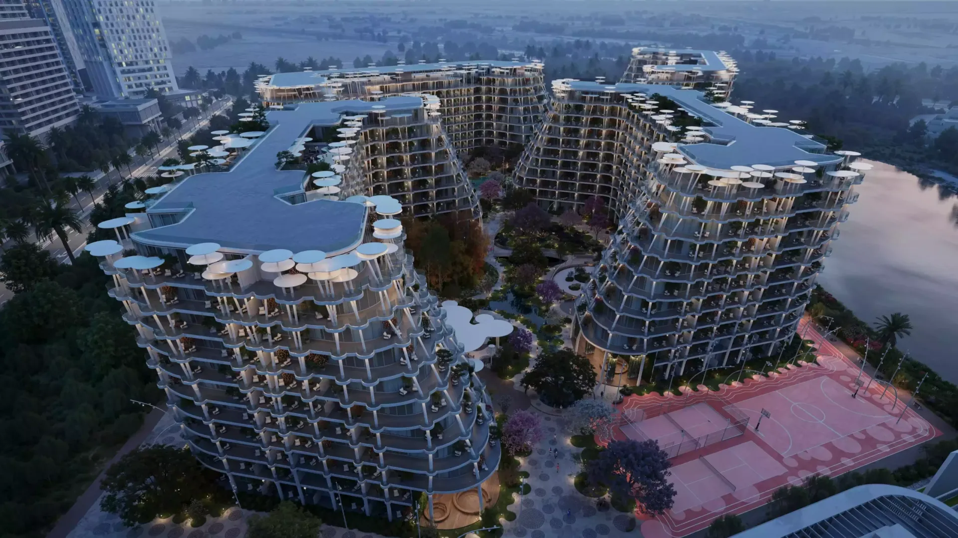 Aerial render of Sakura Gardens' terraced buildings and landscaped courtyards at dusk