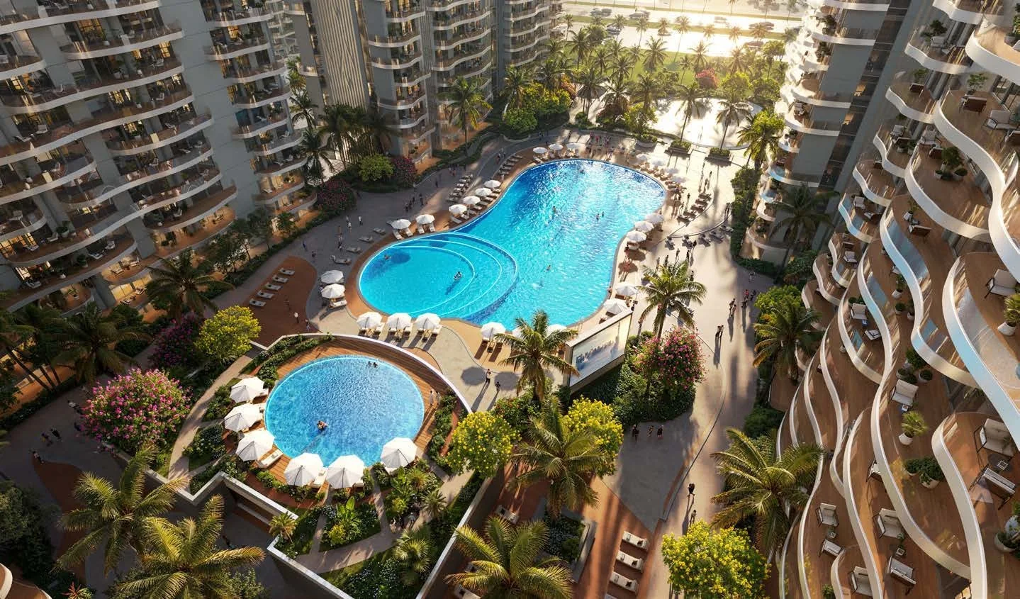 Aerial render of two pools and sun loungers between the Sorrento buildings